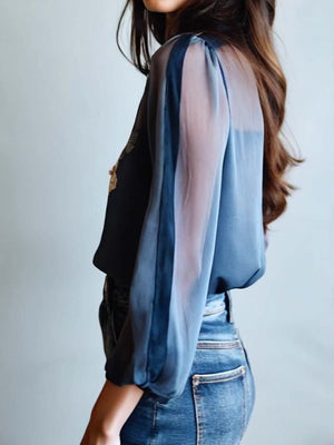 Blusa bohemia floral elegante