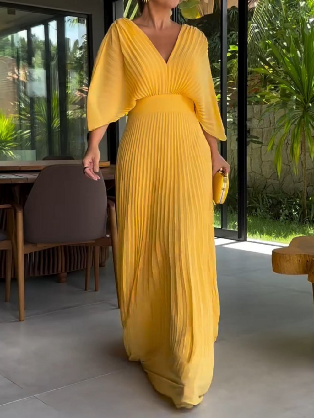 Vestido maxi plisado colorido con caída elegante