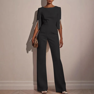 Women’s Elegant Wide-Leg Evening Jumpsuit with Cape Sleeves