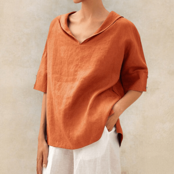 Blusa oversized para mujer con escote en V relajado y mangas cortas enrolladas