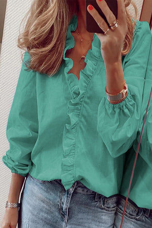 Blusa con volantes y escote en V de manga larga para mujer