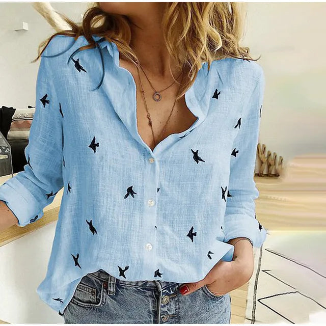 Blusa elegante estampada con botones