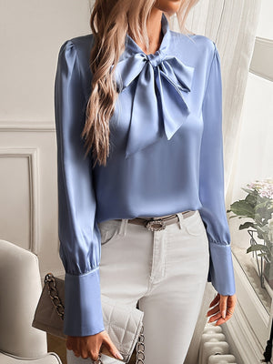 Blusa elegante con lazo y manga larga para mujer