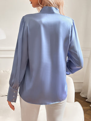 Blusa elegante con lazo y manga larga para mujer