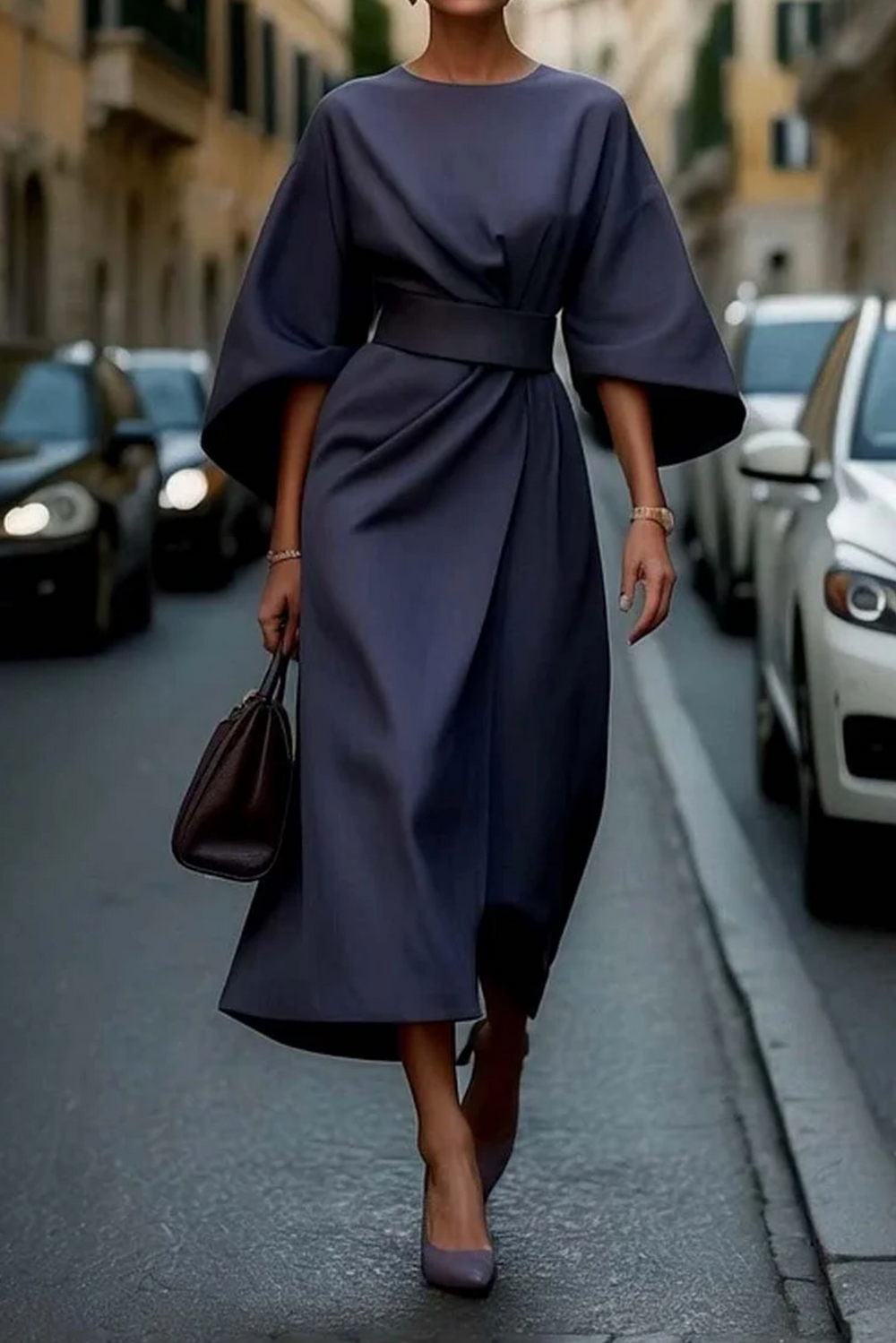 Vestido maxi elegante con cinturón y diseño fluido