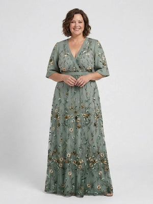 Vestido largo floral de mujer con mangas transparentes
