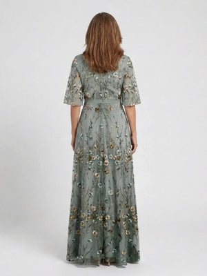 Vestido largo floral de mujer con mangas transparentes