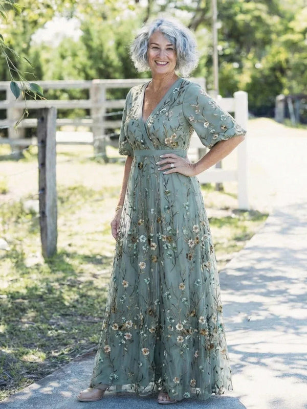 Vestido largo floral de mujer con mangas transparentes
