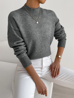 Suéter minimalista de cuello redondo y punto relajado para mujer