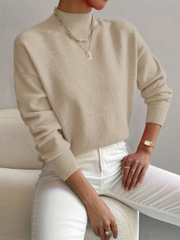 Prenda de punto elegante de cuello alto y cálida
