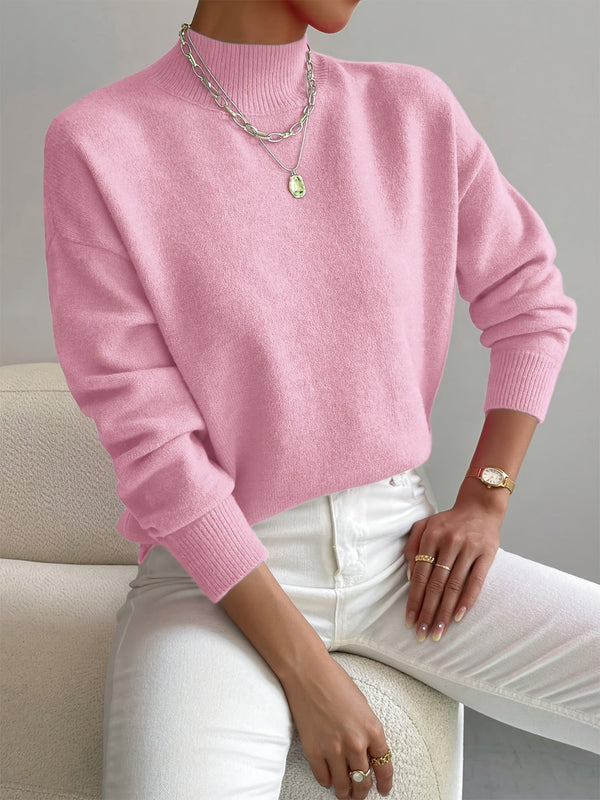 Prenda de punto elegante de cuello alto y cálida