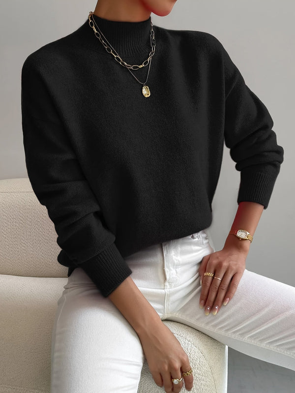 Prenda de punto elegante de cuello alto y cálida