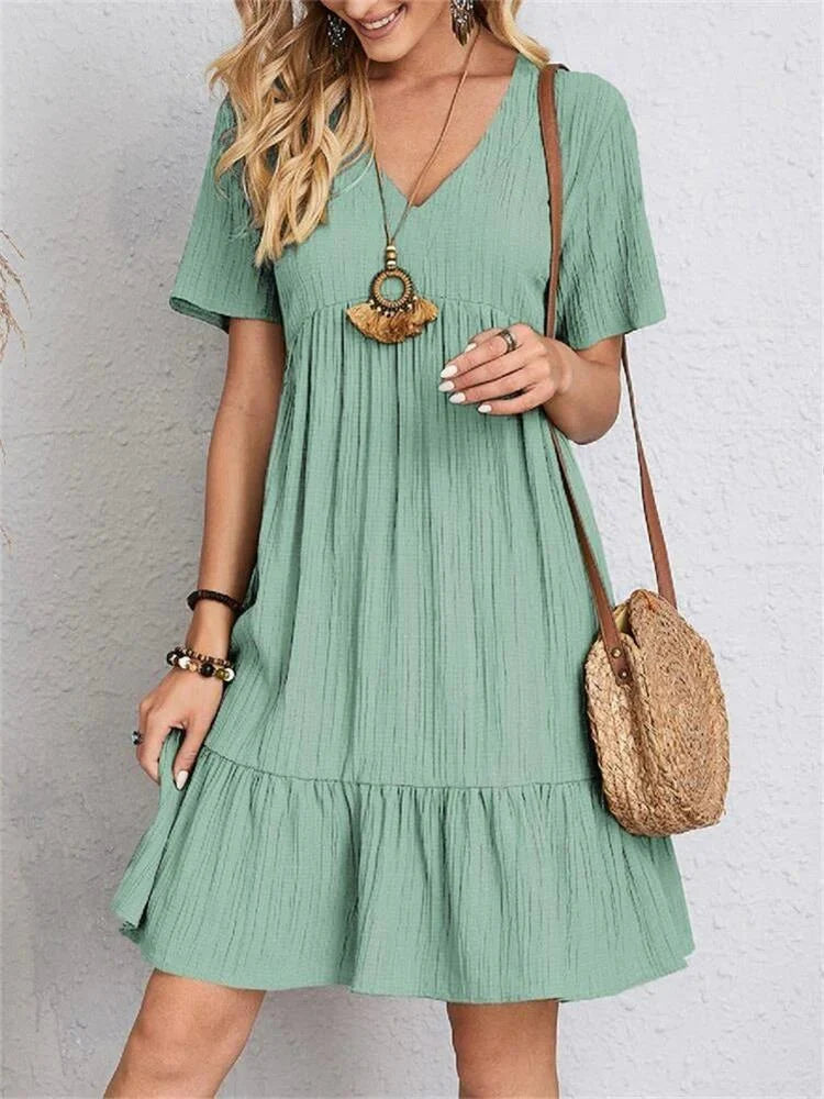 Vestido retro ajustado con escote en V y control de abdomen